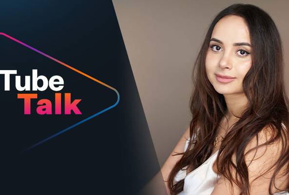 Young woman with long hair next to colorful Tube Talk logo on dark background
