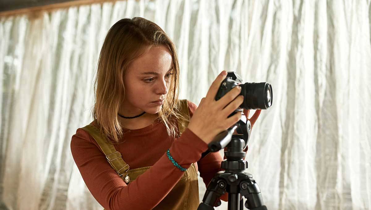 female youtuber setting up camera