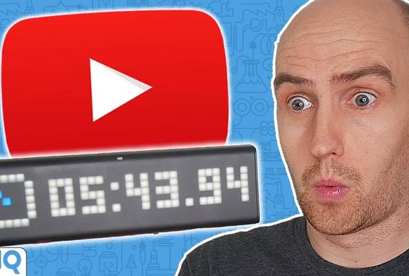 Man reacting to a digital timer and YouTube logo, vidIQ branding in the corner.
