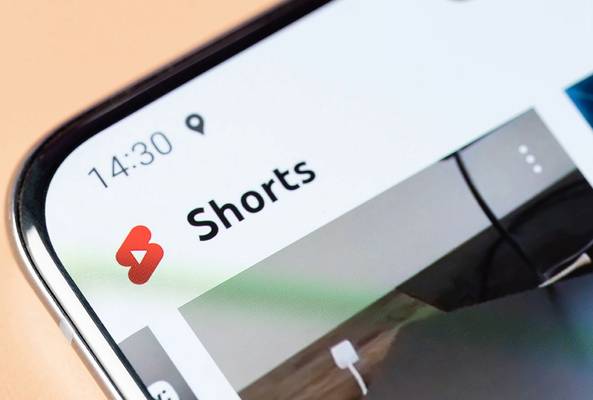 YouTube Shorts section displayed on a smartphone screen with time 14:30 visible