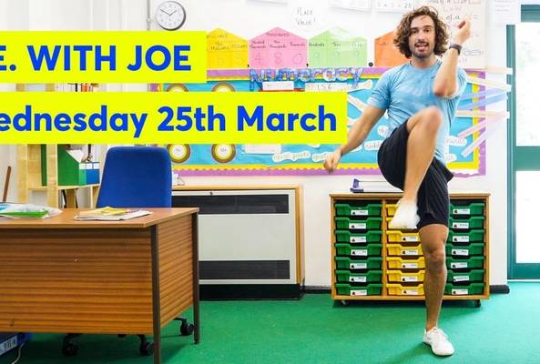 Man in classroom doing exercise for P.E. with Joe on Wednesday 25th March