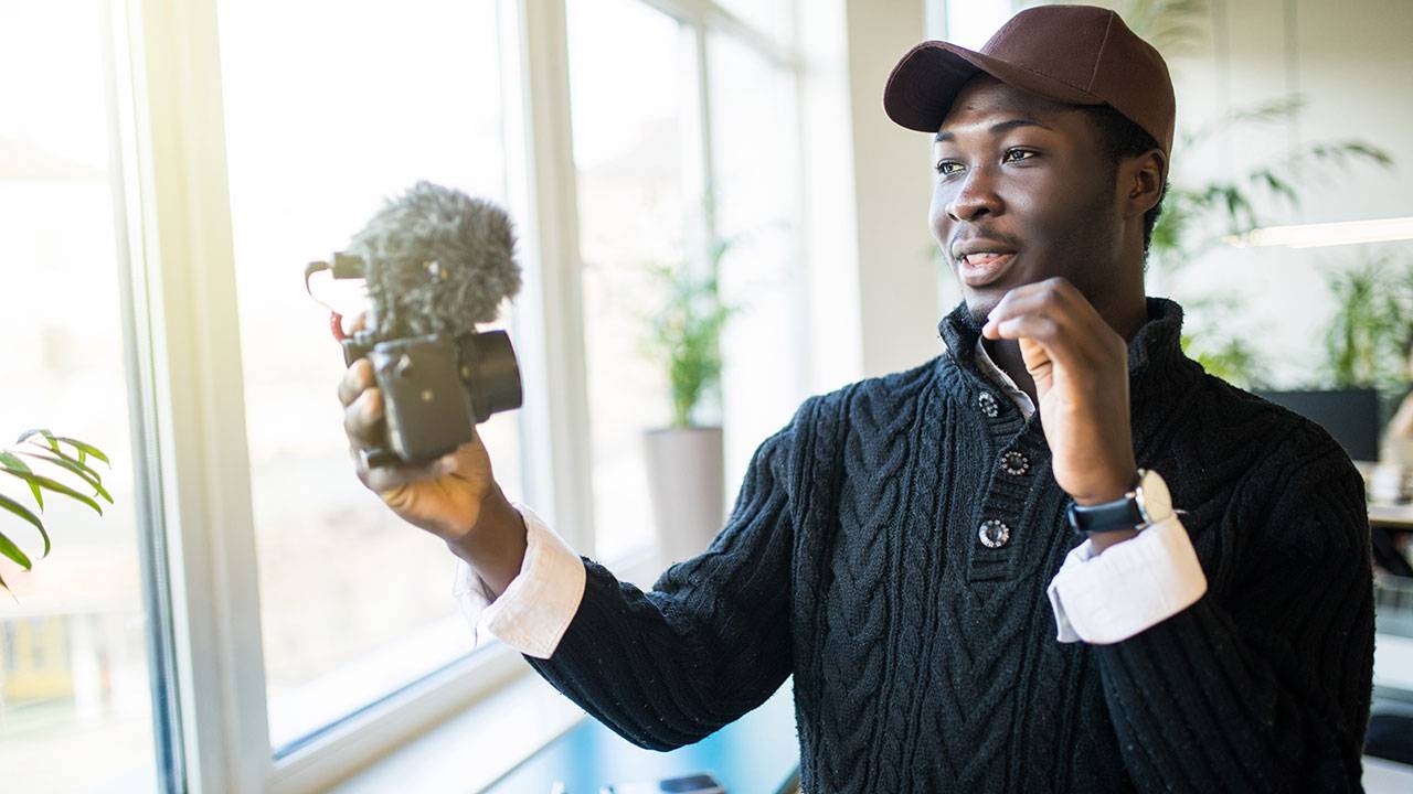 Man recording a vlog
