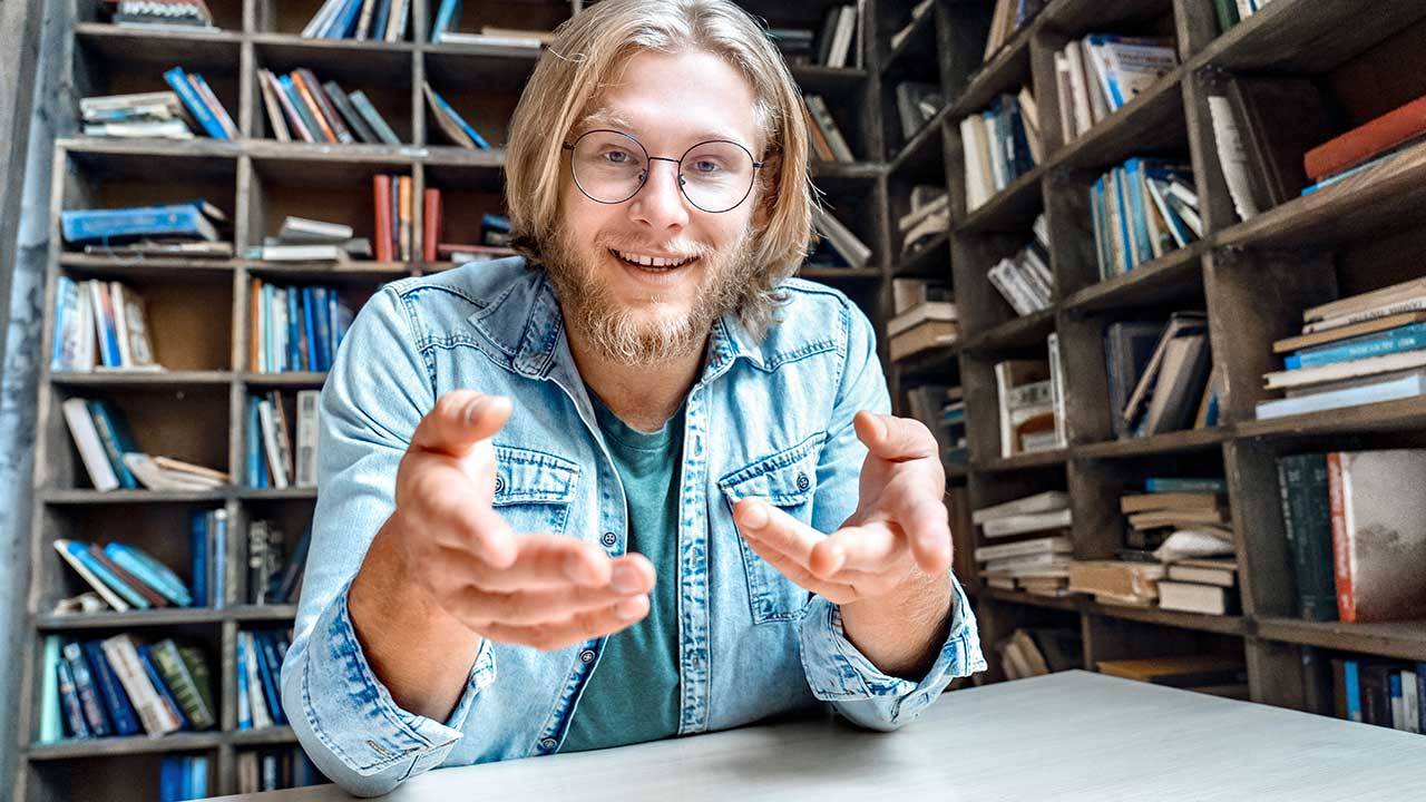 A man telling a story with animated expression
