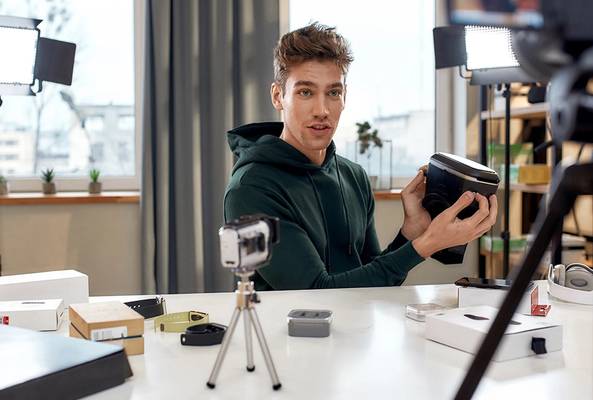 Man filming product review