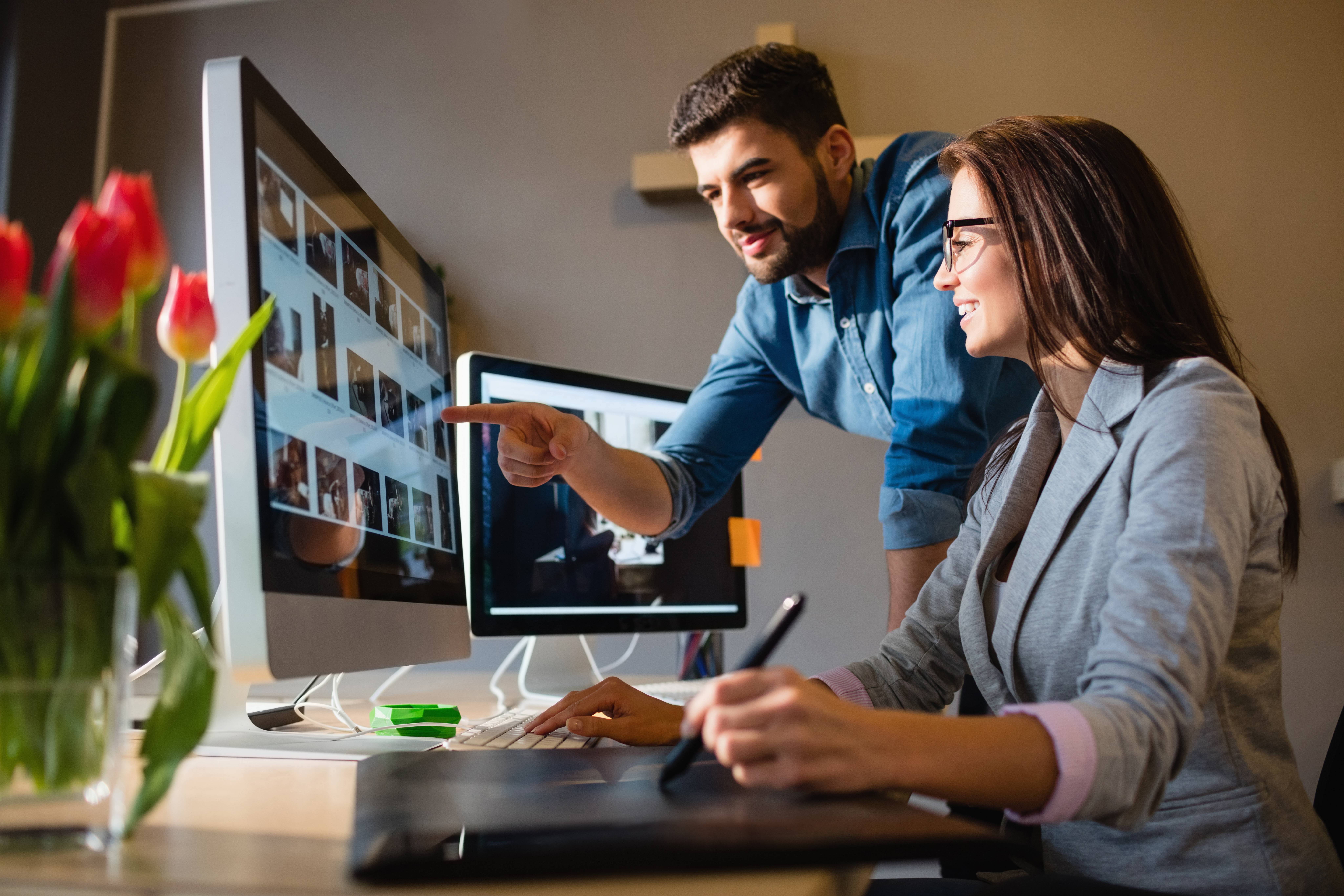 man and woman designing thumbnail
