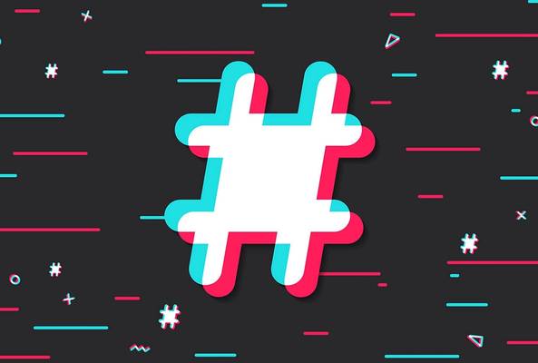 Colorful glitch effect hashtag symbol on dark background with abstract shapes design