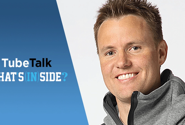 Smiling man next to TubeTalk logo with text "What's (In) Side?" on blue gradient background