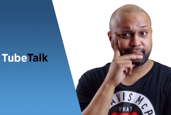 Man making a thinking gesture next to blue background with TubeTalk logo text.